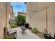 Cozy backyard patio with outdoor seating, a grill, and string lights, creating an inviting outdoor space at 622 Quaint Acres Ave, Las Vegas, NV 89183