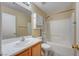 Functional bathroom with a tub-shower combo, vanity, and coordinated fixtures, creating a clean and practical space at 622 Quaint Acres Ave, Las Vegas, NV 89183