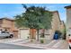 Charming two-story home features a one car garage and low maintenance landscaping at 622 Quaint Acres Ave, Las Vegas, NV 89183