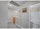 Well-lit upper hallway with gray carpet and bathroom access at 622 Quaint Acres Ave, Las Vegas, NV 89183