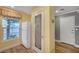 Kitchen showcasing a pantry, wood-look flooring, and a garden view at 622 Quaint Acres Ave, Las Vegas, NV 89183