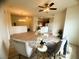 Inviting living room with hardwood floors and cozy seating, filled with natural light at 6313 Snap Ridge St # 201, North Las Vegas, NV 89081