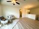 Bright, modern living room area with neutral paint, lots of light, and hardwood floors at 6313 Snap Ridge St # 201, North Las Vegas, NV 89081