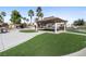 Community playground featuring a covered picnic area, jungle gym, and green space at 6313 Snap Ridge St # 201, North Las Vegas, NV 89081