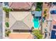 Aerial view showcasing a home with a pool and landscaped backyard at 6630 Virtuoso Ct, Las Vegas, NV 89139