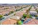 Charming suburban home nestled in a community setting, with lush greenery and a well-maintained street at 6630 Virtuoso Ct, Las Vegas, NV 89139