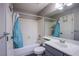 Bathroom featuring a shower-tub combo, single vanity, and a well-lit mirror for everyday convenience at 6630 Virtuoso Ct, Las Vegas, NV 89139