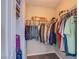 Walk-in closet offering ample storage with hanging rods and shelving for organized clothing and accessories at 6630 Virtuoso Ct, Las Vegas, NV 89139