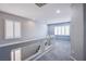 Upstairs hallway with carpet floors and natural lighting at 6630 Virtuoso Ct, Las Vegas, NV 89139