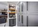 Kitchen area with custom cabinets and stainless steel appliances at 6630 Virtuoso Ct, Las Vegas, NV 89139