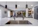 Modern kitchen with a large island and pendant lighting at 6630 Virtuoso Ct, Las Vegas, NV 89139