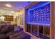 Chic living space with a wine display and access to the kitchen at 6630 Virtuoso Ct, Las Vegas, NV 89139