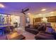 Open concept living area with contemporary design and ample seating at 6630 Virtuoso Ct, Las Vegas, NV 89139