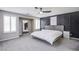 Modern bedroom featuring plush bedding and neutral decor at 6630 Virtuoso Ct, Las Vegas, NV 89139