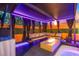 Cozy backyard pergola with comfortable seating, a modern fire pit, and stylish lighting at 6630 Virtuoso Ct, Las Vegas, NV 89139