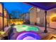 Beautiful backyard pool and spa area, perfect for outdoor entertaining with landscaping and patio at 6630 Virtuoso Ct, Las Vegas, NV 89139