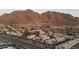 Panoramic aerial view of the neighborhood with majestic mountains providing a scenic backdrop at 6800 E Lake Mead Blvd # 1126, Las Vegas, NV 89156