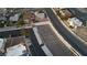 A bird's eye view shows the neighborhood with parking, a basketball court, and nearby homes and apartments at 6800 E Lake Mead Blvd # 1126, Las Vegas, NV 89156