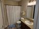 Bathroom featuring a granite vanity, sink, mirror, toilet, and shower with curtain at 6800 E Lake Mead Blvd # 1126, Las Vegas, NV 89156