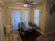 Open concept dining room features modern wood flooring and sliding glass doors at 6800 E Lake Mead Blvd # 1126, Las Vegas, NV 89156