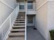A set of stairs leads to the front door of this condo at 6800 E Lake Mead Blvd # 1126, Las Vegas, NV 89156