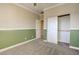 Cozy bedroom with neutral walls, carpeting, and a closet at 6826 Dovecote Ave, North Las Vegas, NV 89084