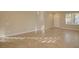 Bright living room featuring neutral paint, crown molding, tile floors, and natural light at 6826 Dovecote Ave, North Las Vegas, NV 89084