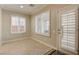 Inviting room features plantation shutters, neutral walls, and tile flooring at 6826 Dovecote Ave, North Las Vegas, NV 89084
