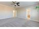 This large main bedroom features an ensuite bathroom and staircase entry at 6826 Dovecote Ave, North Las Vegas, NV 89084