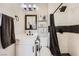 Bathroom featuring a new vanity and shower with black and white tile at 80 E Texas Ave, Henderson, NV 89015