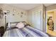 Bedroom featuring decor, a closet, and neutral walls at 80 E Texas Ave, Henderson, NV 89015