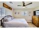 Bedroom featuring neutral walls, carpet, and a full size bed at 80 E Texas Ave, Henderson, NV 89015