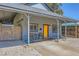 Cozy single-story home with charming covered porch and desert landscaping at 80 E Texas Ave, Henderson, NV 89015