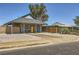 Inviting single-story home with covered porch and low-maintenance desert landscaping at 80 E Texas Ave, Henderson, NV 89015