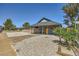 Quaint single-story home with desert landscaping and a covered porch at 80 E Texas Ave, Henderson, NV 89015