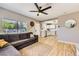 Bright living room showcasing hardwood floors and large windows for plenty of light at 80 E Texas Ave, Henderson, NV 89015