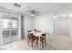 Charming dining area featuring a modern table set, natural lighting, and access to the balcony, ideal for gatherings at 8600 W Charleston Blvd # 2085, Las Vegas, NV 89117