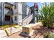 Condo exterior showcasing modern architecture with private balcony and landscaped front, a great curb appeal at 8600 W Charleston Blvd # 2085, Las Vegas, NV 89117