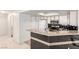 Functional kitchen featuring a breakfast bar, modern appliances, and ample counter space, ideal for meal preparation at 8600 W Charleston Blvd # 2085, Las Vegas, NV 89117