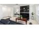 Spacious living room featuring a cozy sofa, modern fireplace, and ample natural light, an inviting atmosphere at 8600 W Charleston Blvd # 2085, Las Vegas, NV 89117
