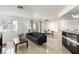 Bright living space with a comfortable sofa, dining area, and open kitchen, perfect for modern living at 8600 W Charleston Blvd # 2085, Las Vegas, NV 89117