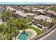A beautiful property with a large yard, well-kept landscaping, a private pool and mature palm trees at 8970 Lansberry Ct, Las Vegas, NV 89147