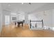 Bright and airy bonus room with a pool table and staircase leading to the next level at 8970 Lansberry Ct, Las Vegas, NV 89147