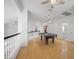 Upstairs bonus room with billiard table and open view to staircase and landing at 8970 Lansberry Ct, Las Vegas, NV 89147