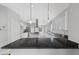 Spacious kitchen with an island, pendant lights, and modern appliances, perfect for culinary enthusiasts at 8970 Lansberry Ct, Las Vegas, NV 89147