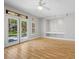 Spacious living room with a view of the backyard through large doors and windows at 8970 Lansberry Ct, Las Vegas, NV 89147
