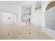 Expansive living area boasting soaring ceilings, elegant chandelier, and views to the upper level at 8970 Lansberry Ct, Las Vegas, NV 89147
