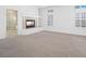 The spacious main bedroom features a fireplace, large windows, and an ensuite bathroom at 8970 Lansberry Ct, Las Vegas, NV 89147
