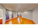 Spacious bedroom featuring hardwood floors, recessed lighting, and access to an ensuite bathroom and walk-in closet at 9116 Tailor Made Ave, Las Vegas, NV 89149