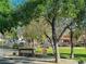 The South Commons community sign is surrounded by mature trees and green spaces at 9116 Tailor Made Ave, Las Vegas, NV 89149
